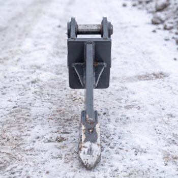 Front view of the frost ripper showing the shank width, mounting ears and pin bosses